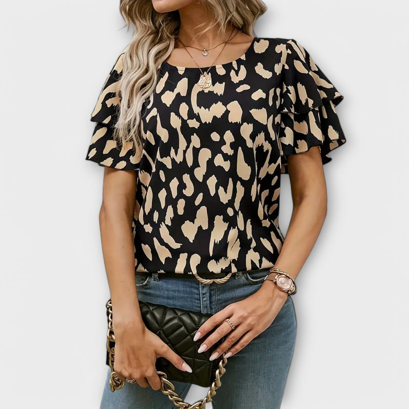 Lela - Stylish blouse with panther sleeves