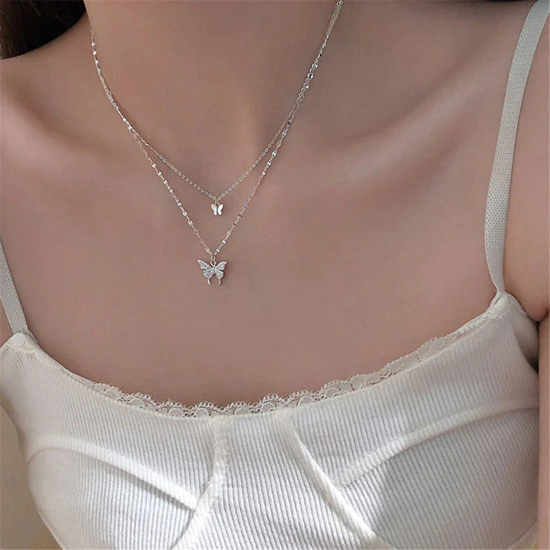 Refined silver necklace with glittering butterfly