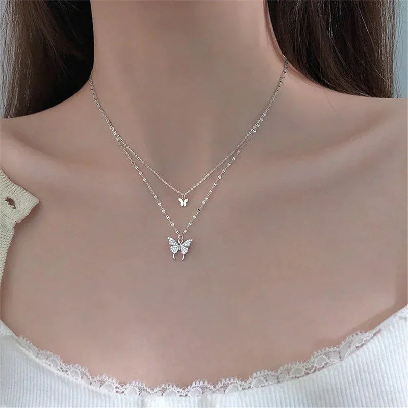 Refined silver necklace with glittering butterfly